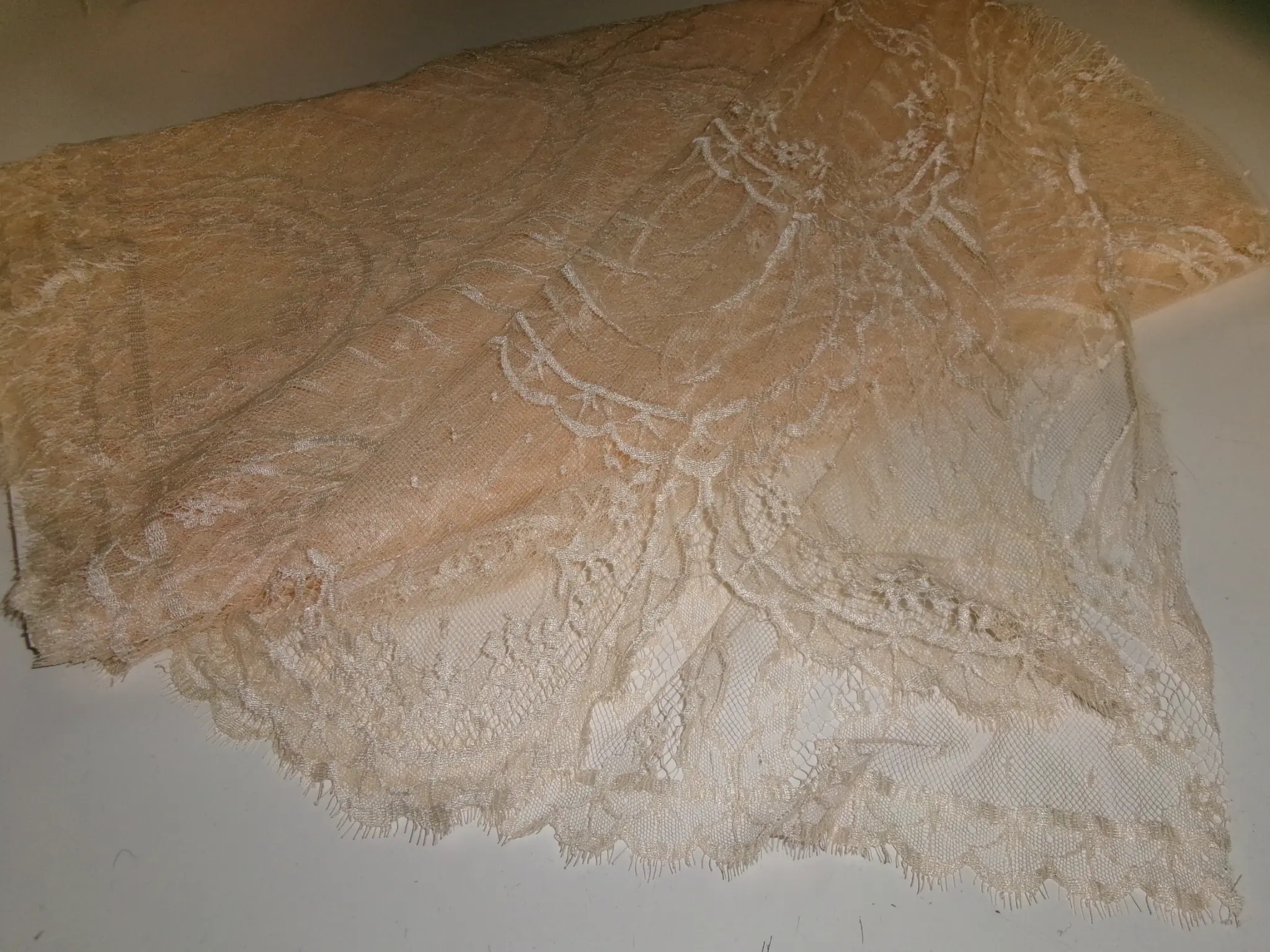 French Calais lace, peach/champagne, 40" wide