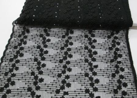 Black appliqued lace netting