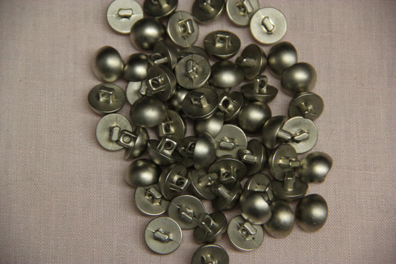 Matte silver tone buttons